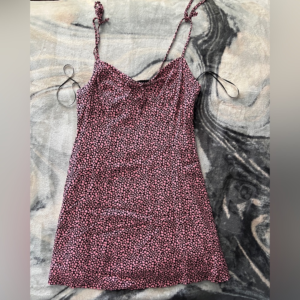 Black dress with pink hearts